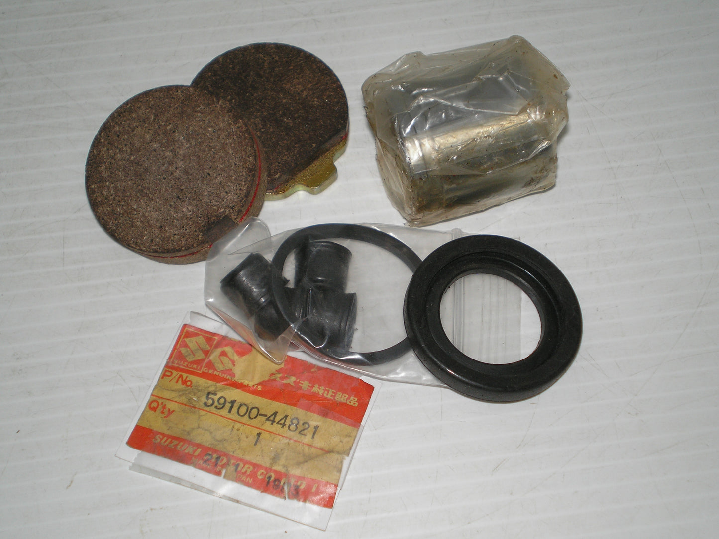 SUZUKI GS400 GS750  Factory Brake Caliper Piston Set  59100-45831
