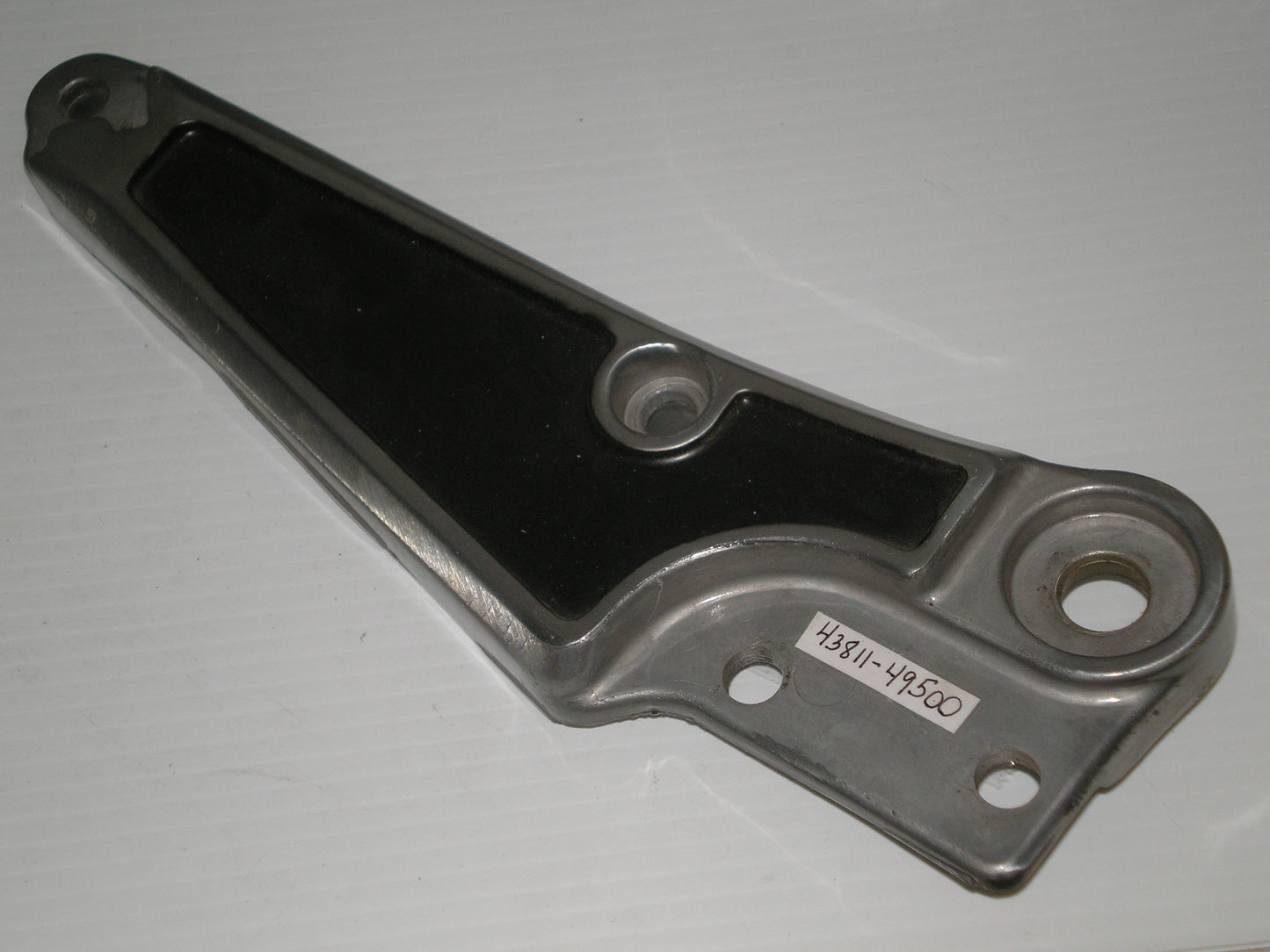 SUZUKI GS1100 1982-1983 R/H Footrest & Muffler Bracket 43811-49500