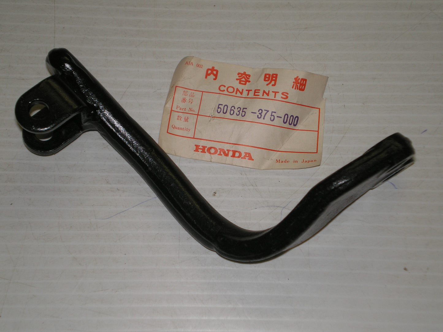 HONDA CB500 T 1976 R/H Footrest Bar / Bracket 50635-375-000