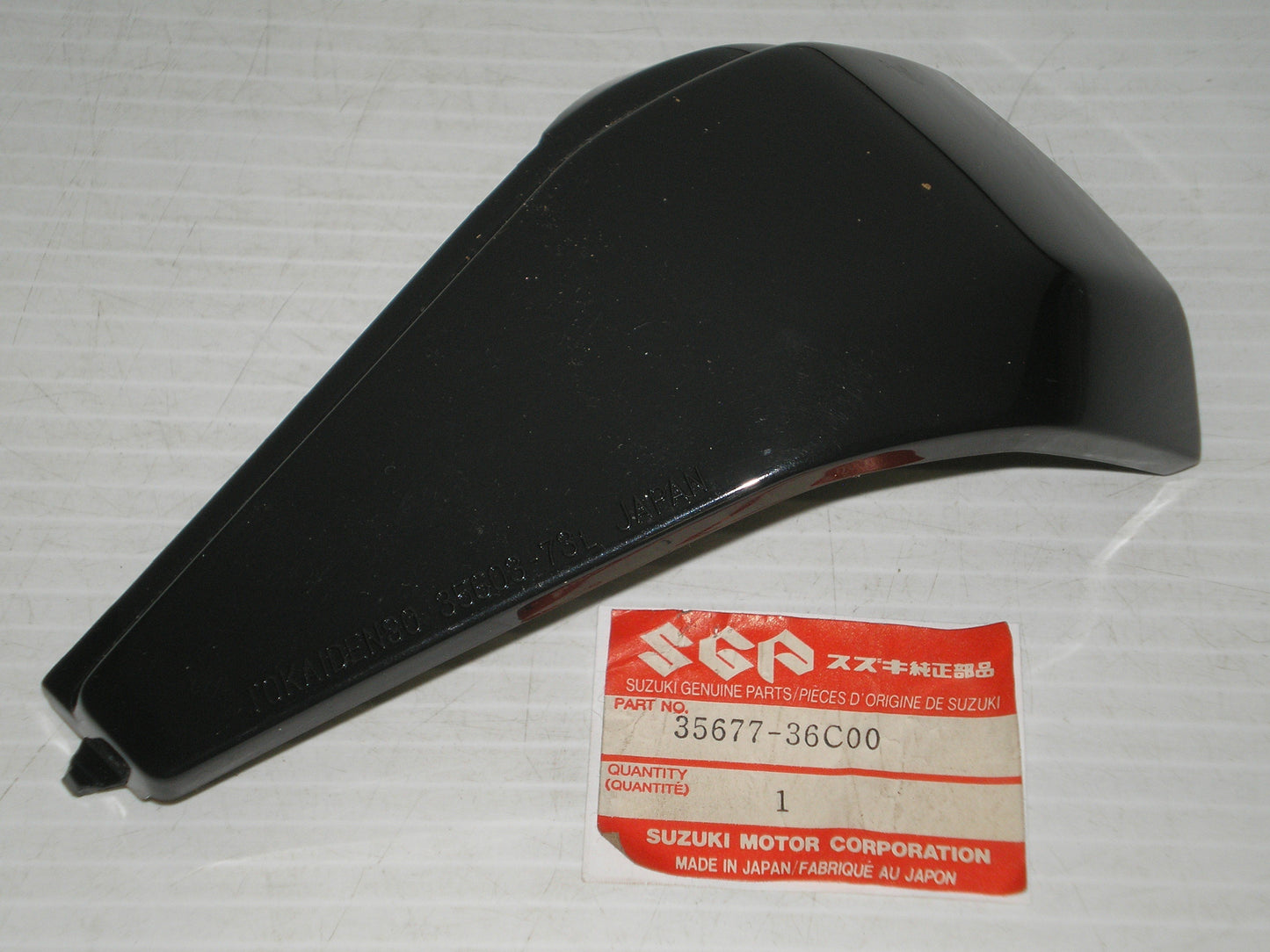 SUZUKI AE50 1990 Rear Left Hand Turn Signal Cover 35677-36C00