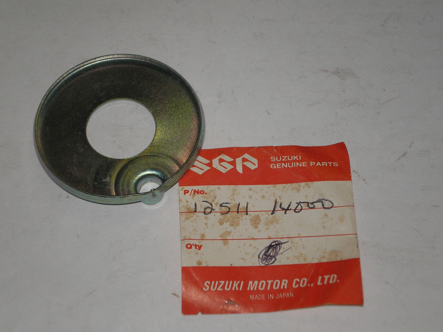 SUZUKI T125 1967-1971 Crankshaft Bearing Oil Guide Plate 12511-14000